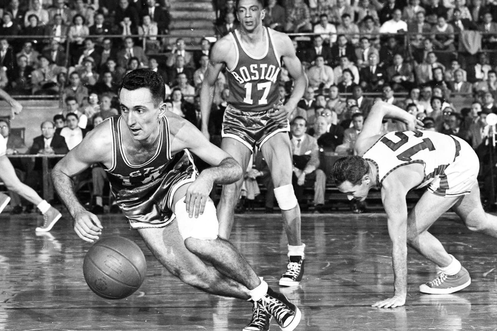 Cousy on the ball for Boston. The pros thought he was a showboat.