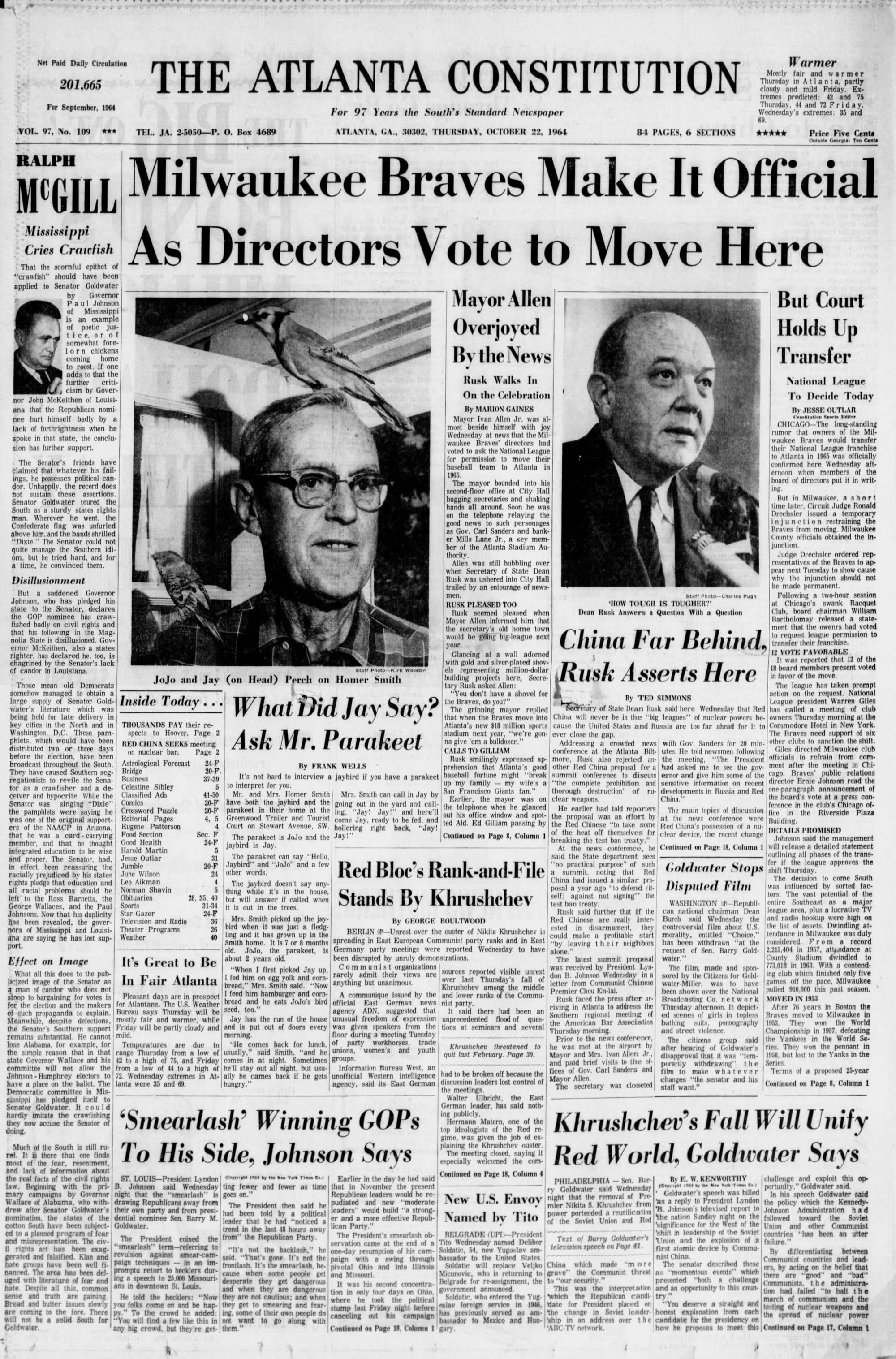 "Milwaukee Braves Make It Official As Directors Vote to Move Here." Below it: "Mayor Allen Overjoyed By the News" and "But Court Holds Up Transfer." (The Atlanta Constitution, Oct. 22, 1964, p. 1, via Newspapers.com)