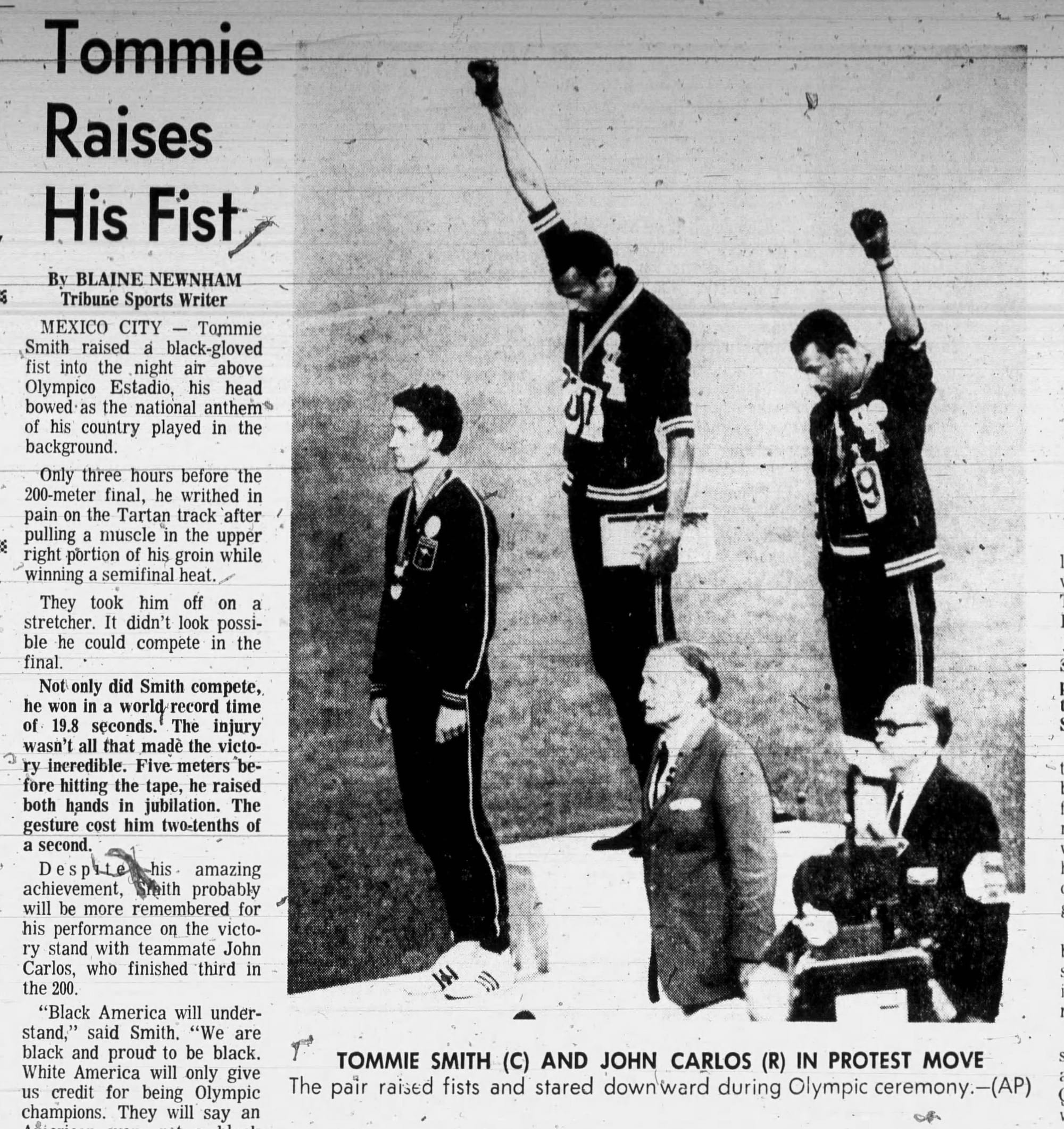 "Tommie Raises His Fist." (Oakland Tribune, Oct. 17, 1968, via Newspapers.com)