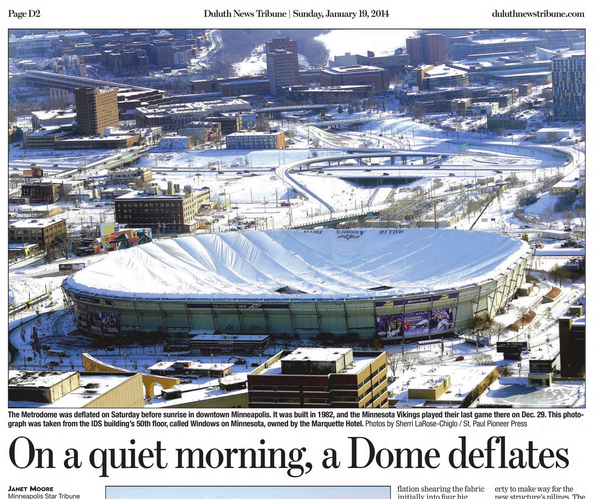 The Metrodome roof comes down, Jan. 18, 2014. (Duluth News-Tribune, Jan. 19, 2014, via Newspapers.com)