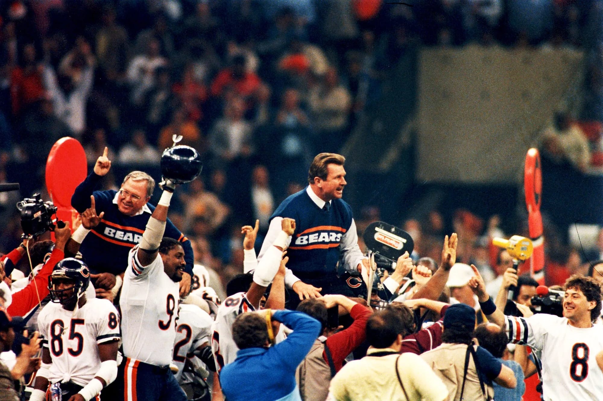Buddy Ryan (left) and Ditka ride off the Superdome field on their players' shoulders after Super Bowl XX.