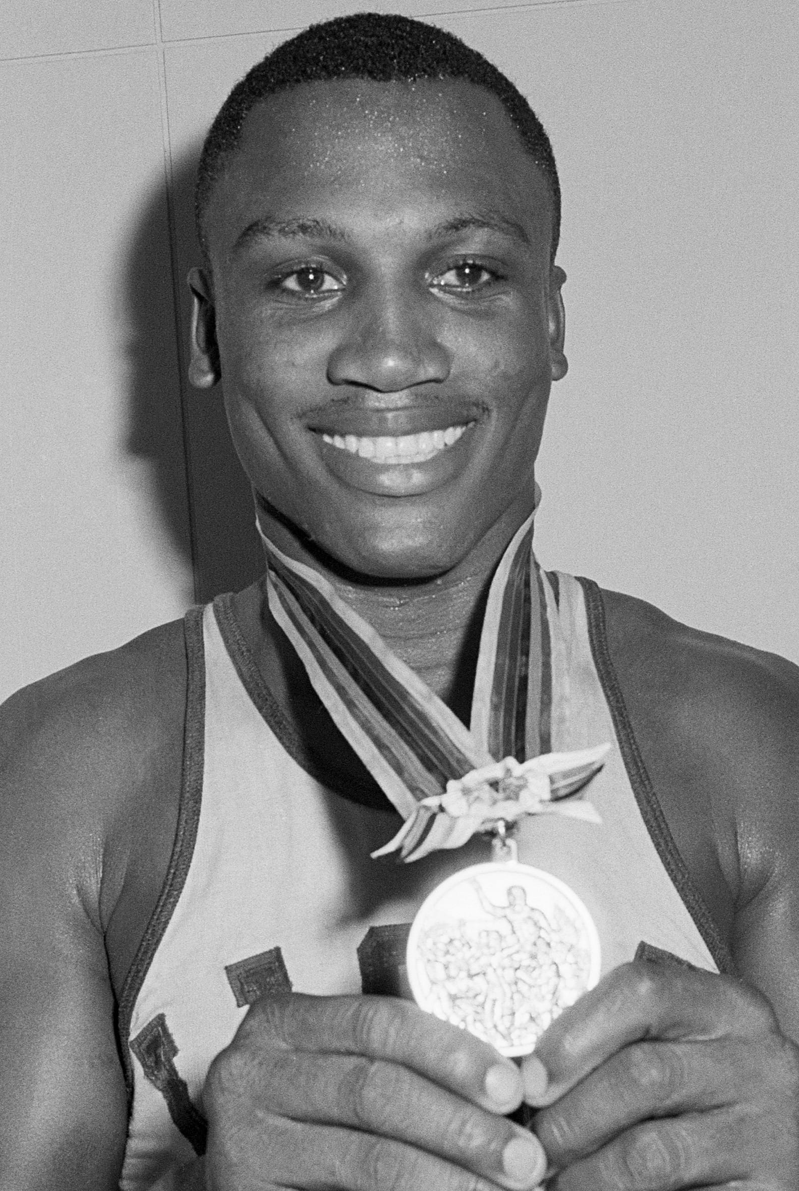 Joe Frazier with his heavyweight gold medal, 1964. (Photo: UPI, public domain)