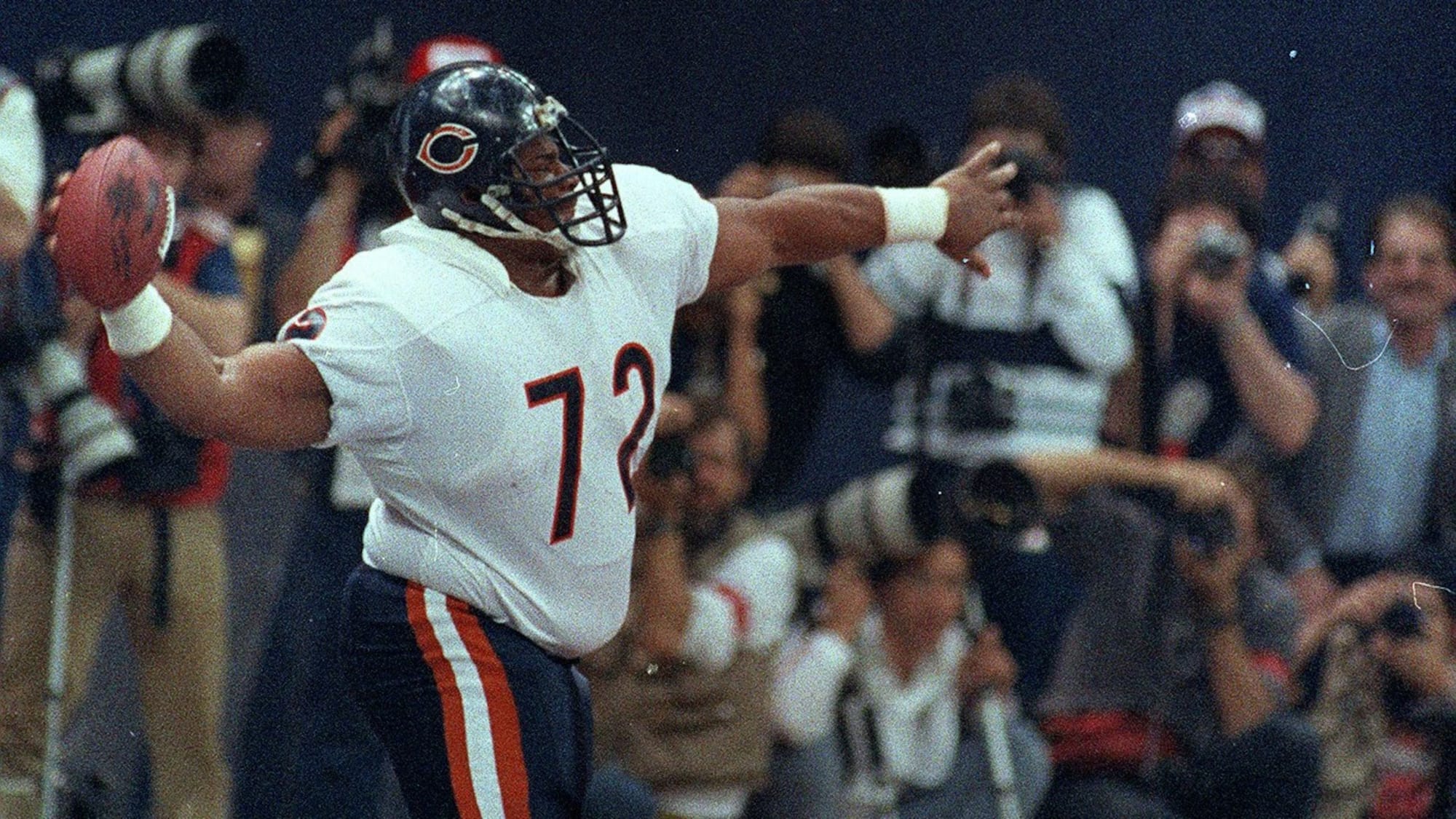 William "Refrigerator" Perry spikes the ball after his Super Bowl XX touchdown.
