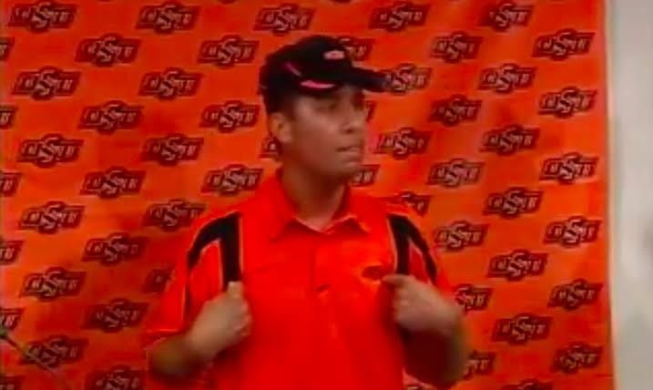 Mike Gundy at the Oklahoma State podium.