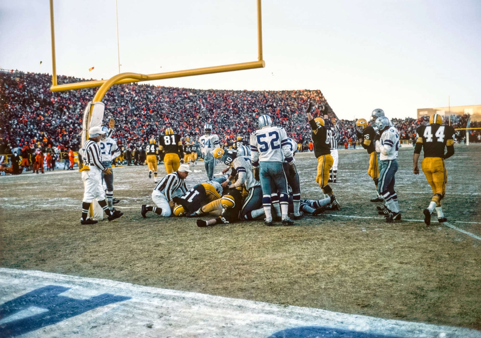 The pile at the goal line after Bart Starr's quarterback sneak won the Ice Bowl.