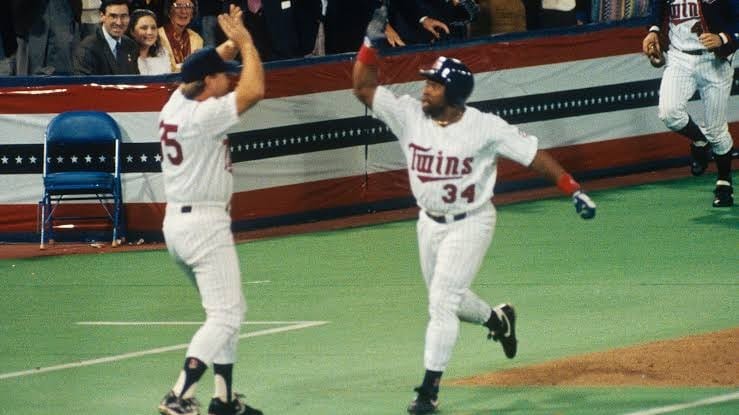 Puckett on his way around the bases.