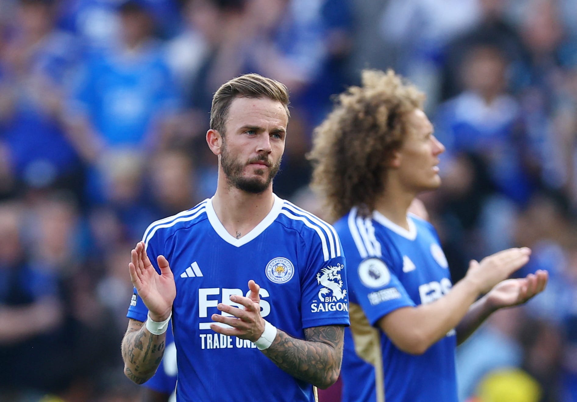 James Maddison applauds Leicester's fans during the 2022-23 season.