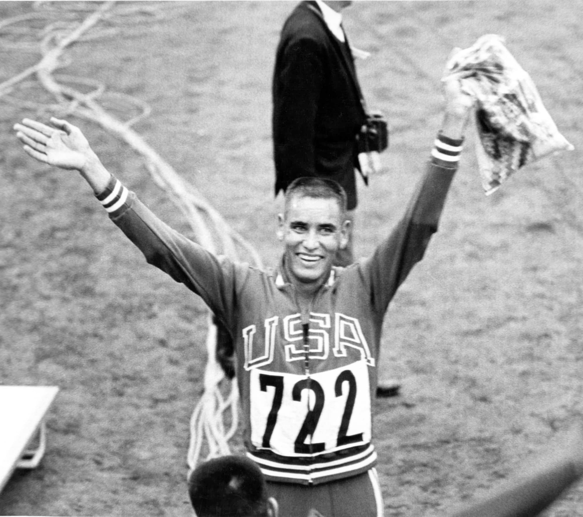 Mills celebrates his Olympic-record win.