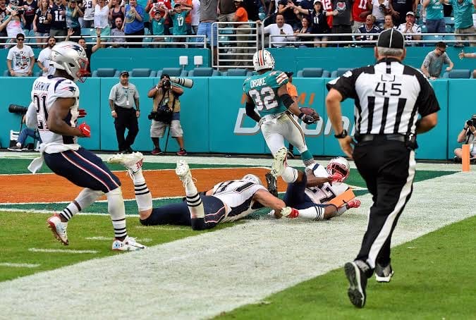 The Dolphins in the end zone as time runs out.
