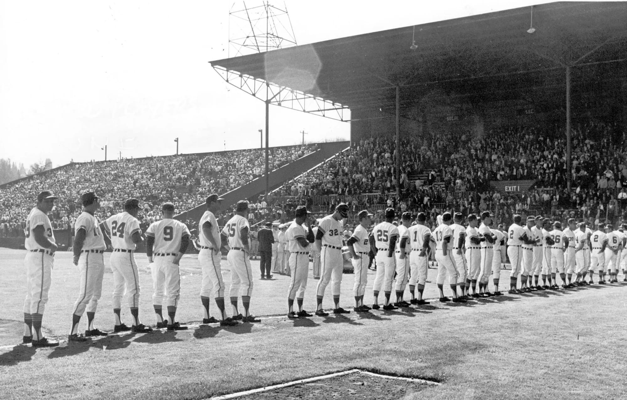 Lineups on the foul line at Sick's Stadium.