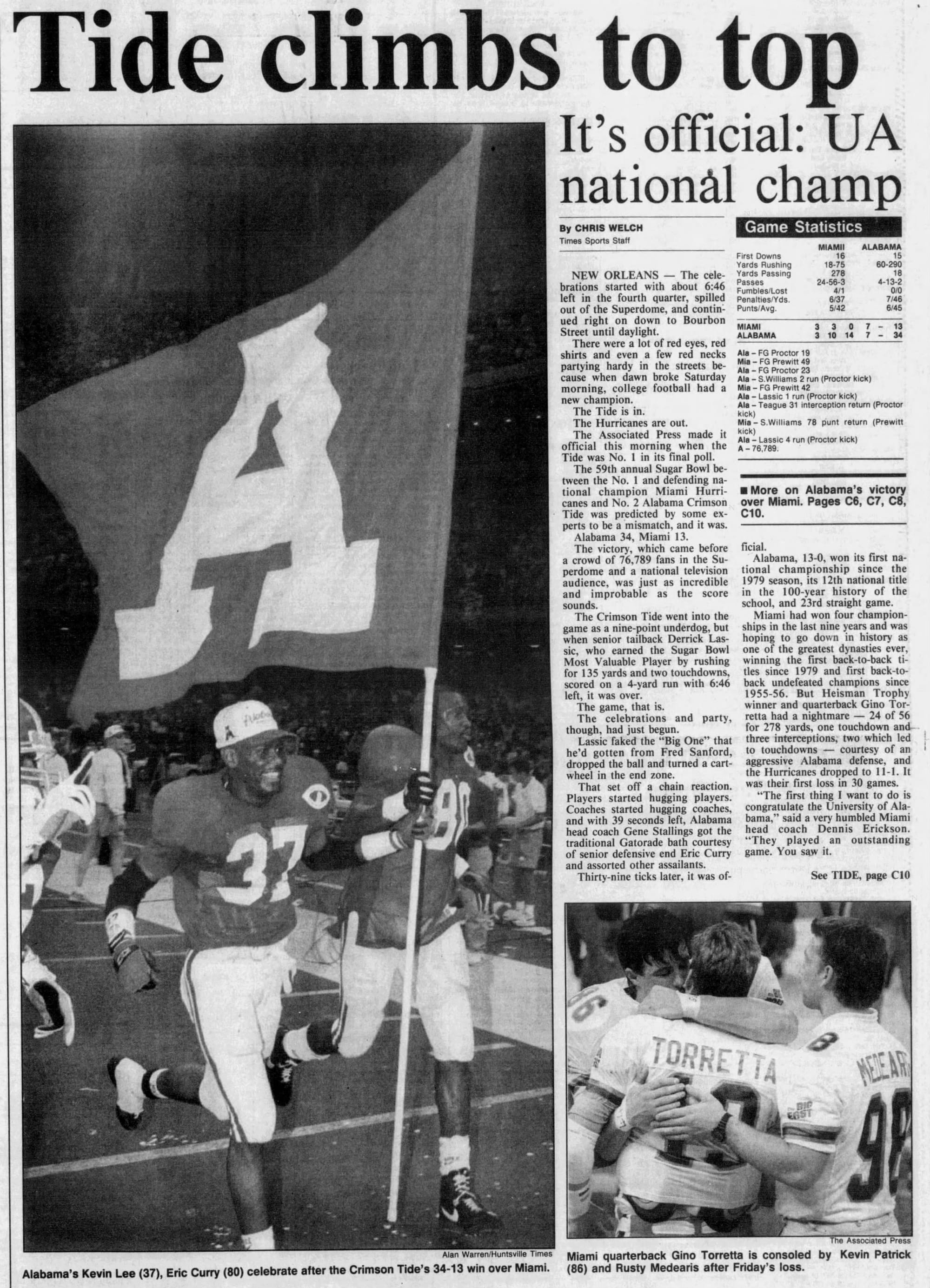 The Huntsville Times, Jan. 2, 1993: "Tide climbs to top." Kevin Lee (37) and Eric Curry (80) carry the flag. (Alan Warren/Huntsville Times; AP)