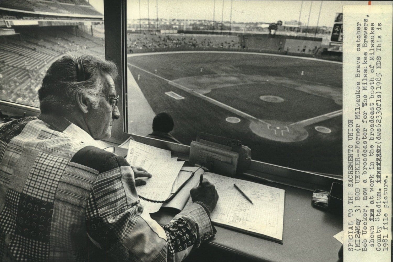 Uecker in the booth at County Stadium.