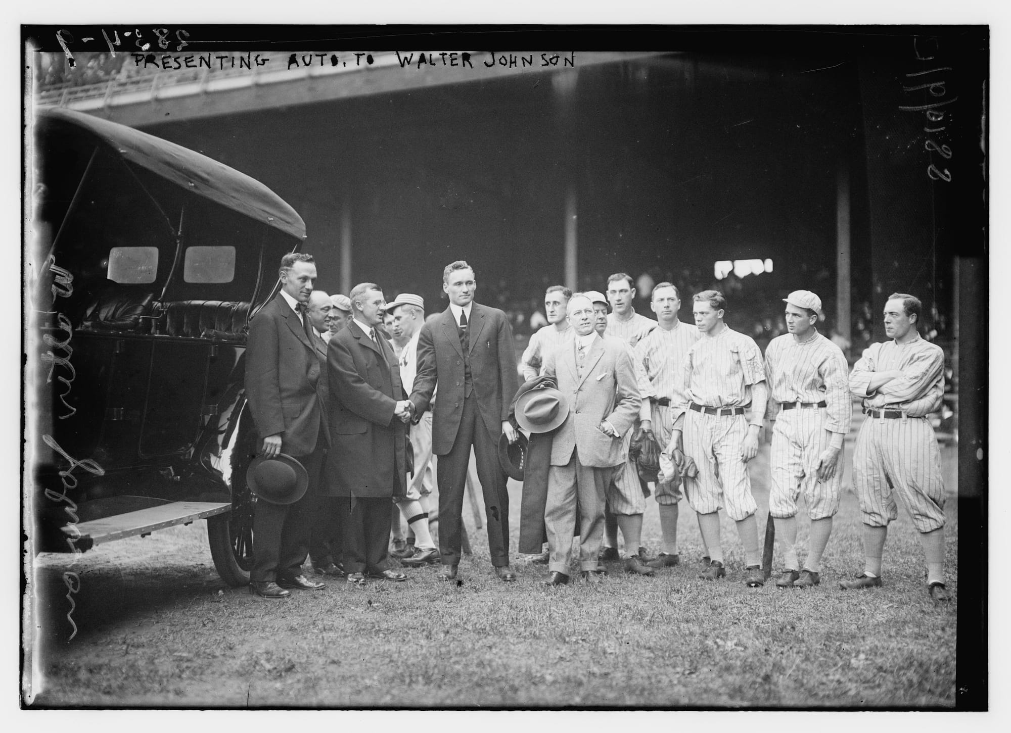 Walter Johnson receives his Chalmers in 1913. (Photo: Bain News Service, Library of Congress, public domain)