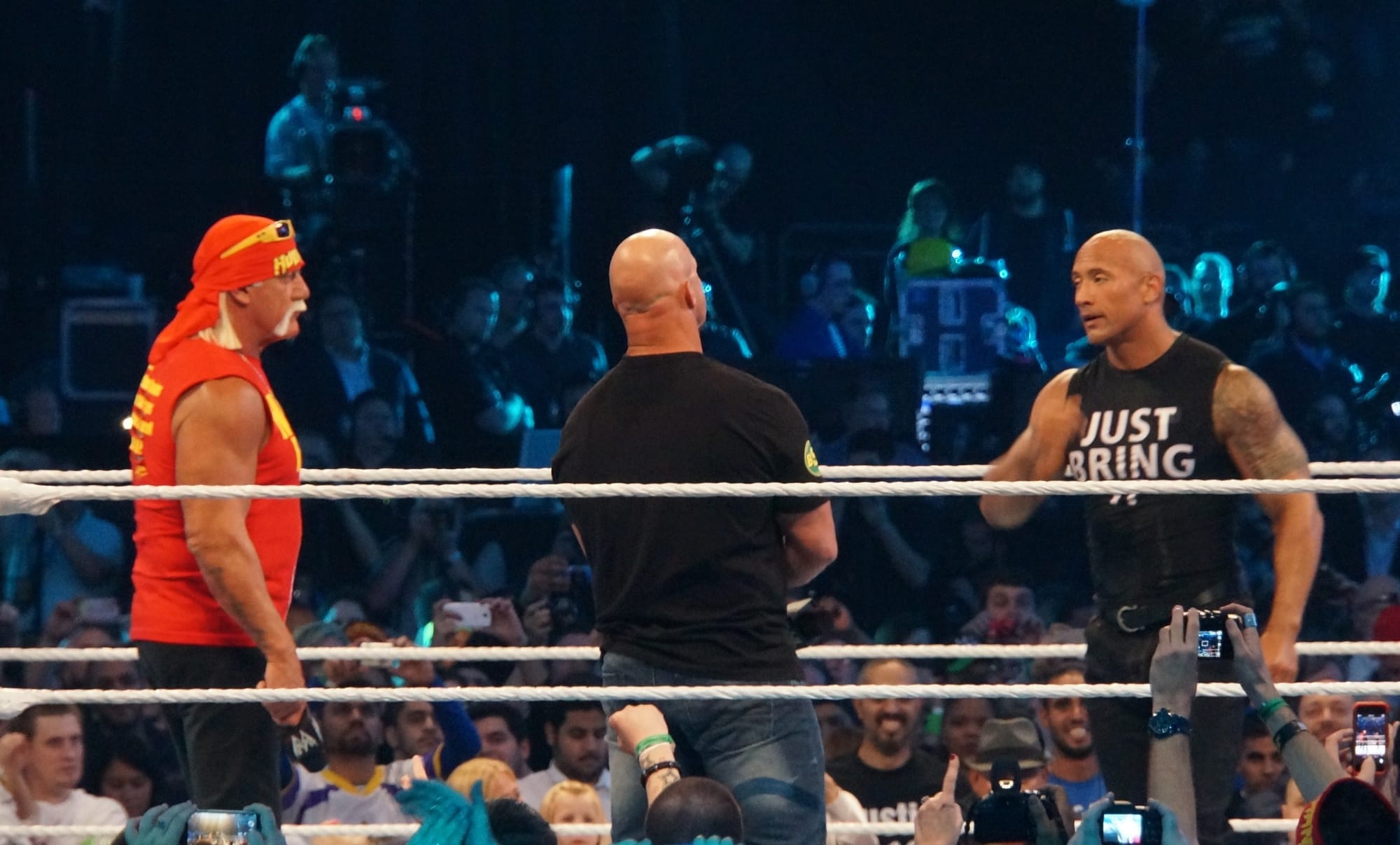 Hulk Hogan, Steve Austin and The Rock open WrestleMania XXX in the Superdome, April 6, 2014. (Photo: Miguel Discart, CC BY-SA 2.0, via Wikimedia Commons)