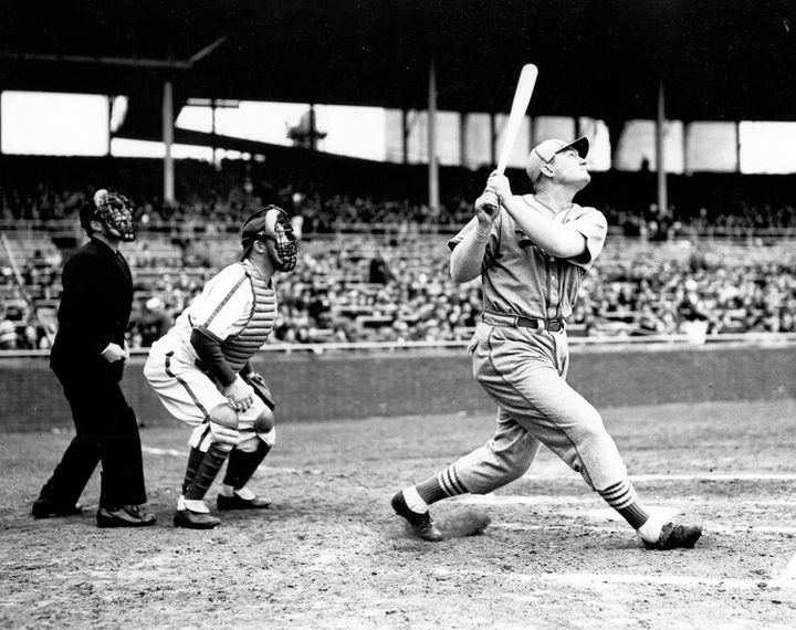Johnny Mize following through on a swing in a St. Louis Cardinals uniform