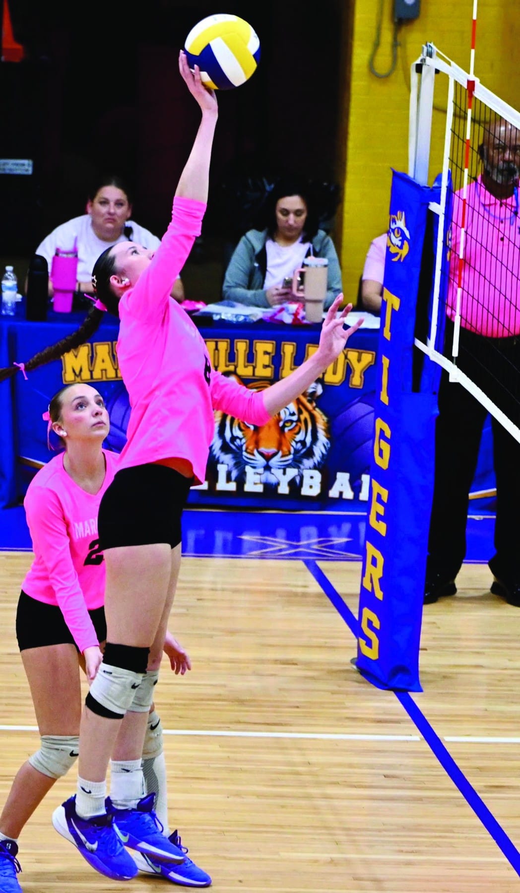 Marksville middle blocker Kennedy McDaniel (#8) attacks at the net. McDaniel recorded 11 kills and four blocks against Eunice.