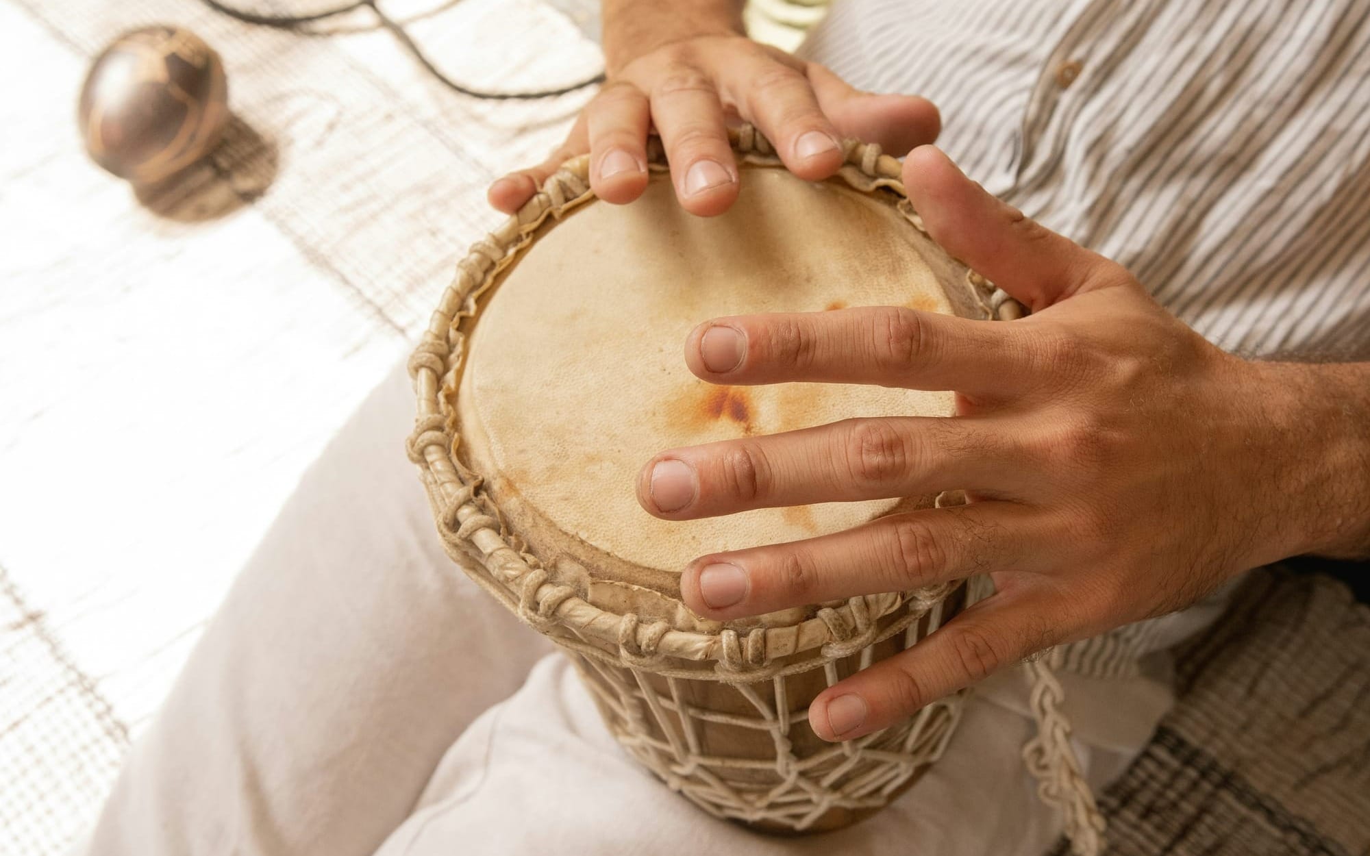 Active music interventions—such as structured rhythmic drumming protocols—serve as powerful non-pharmacological tools to regulate motor control networks, reduce behavioral agitation, and stimulate intact pathways following a neurodegenerative diagnosis.