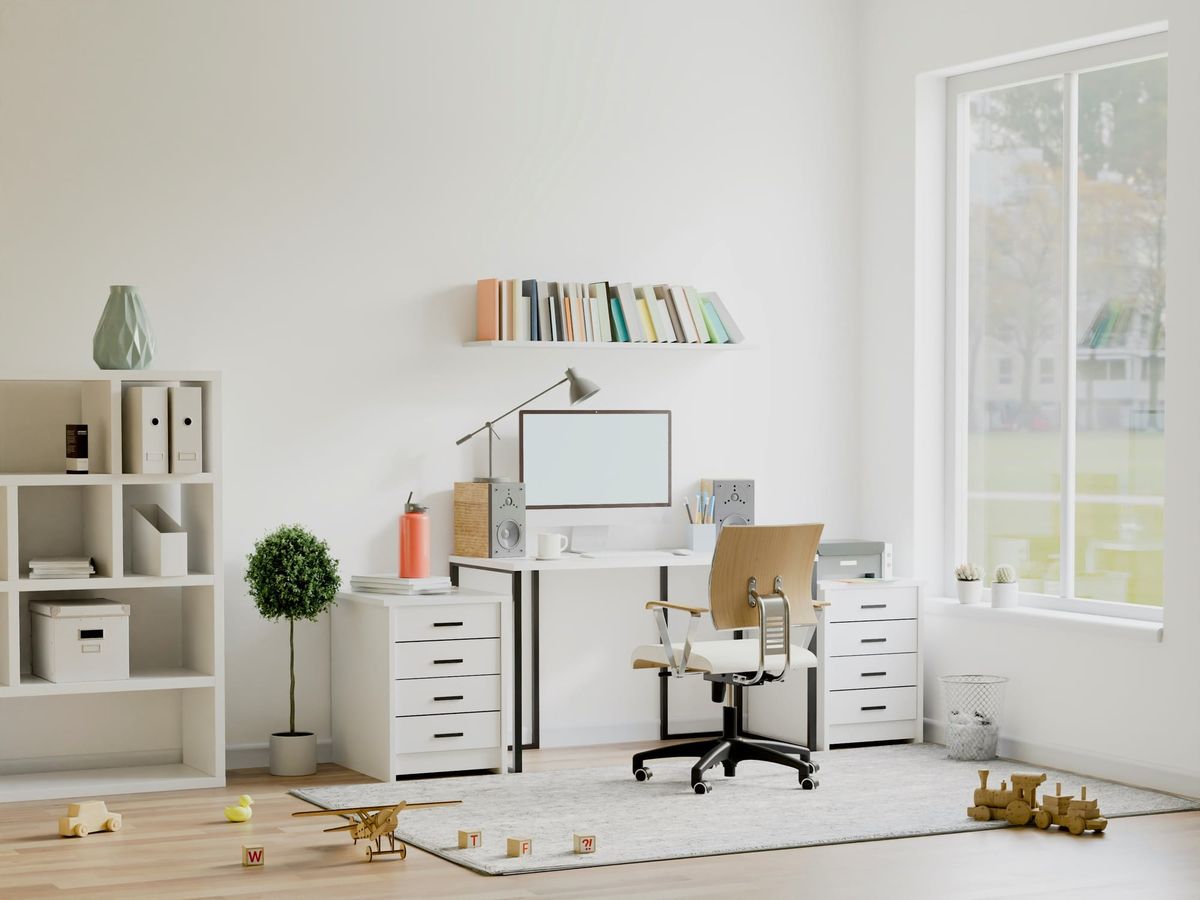 Bright, minimalist home office space with a clean white desk and natural light, illustrating a calm environment for self-paced online learning.
