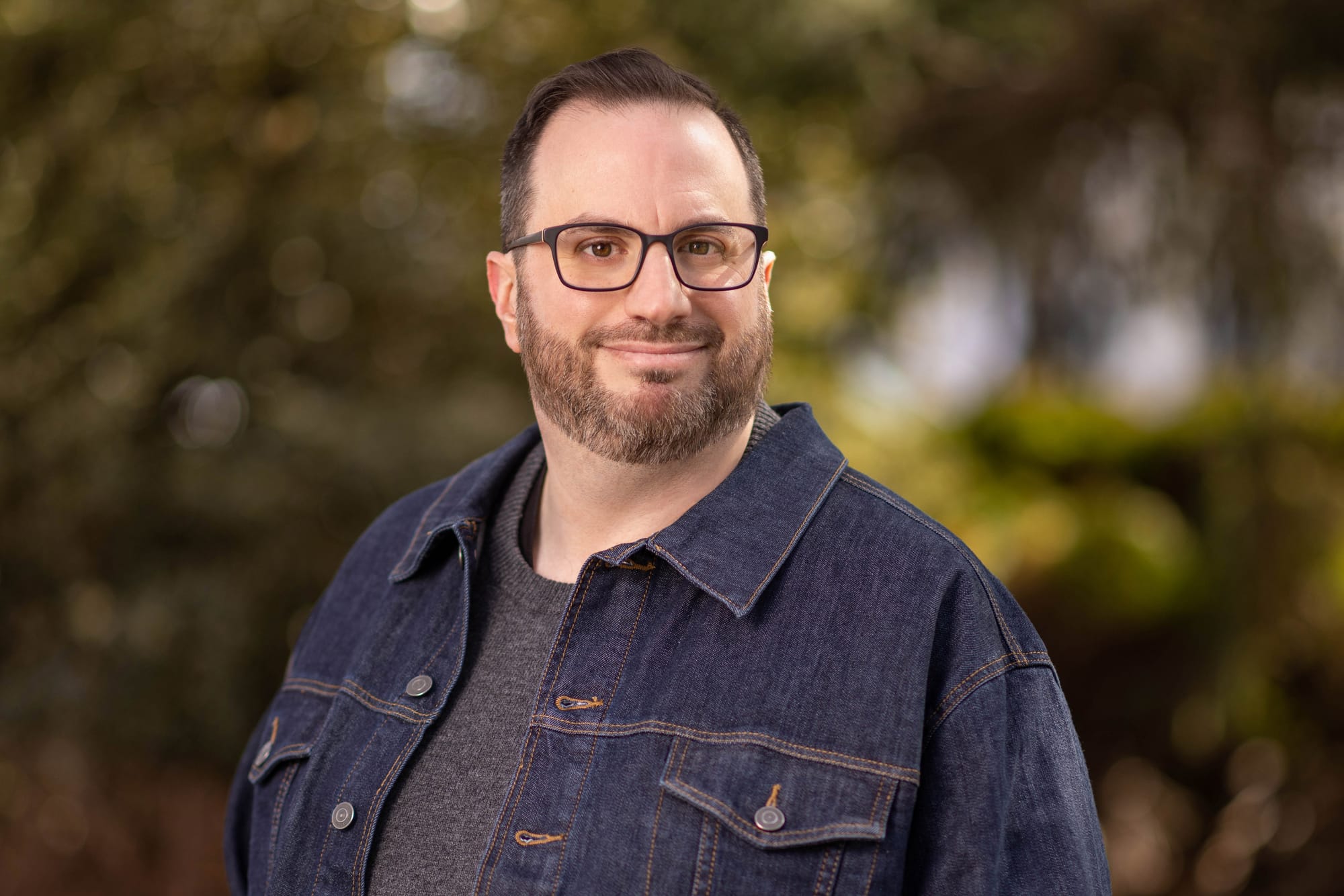 Alan Sepinwall's headshot depicts him in a denim jacket standing in front of a leafy backdrop.