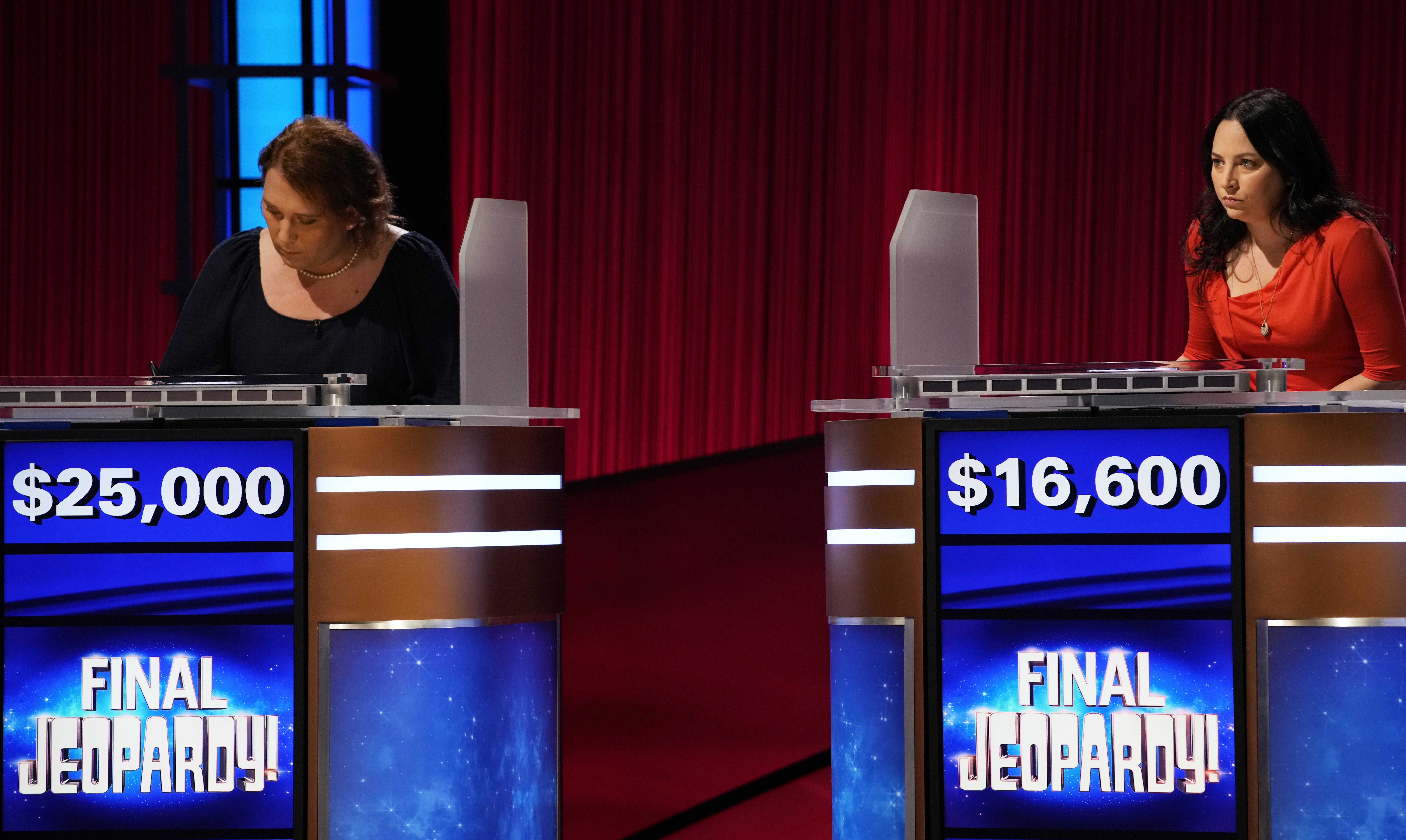 Schneider writes down a Final Jeopardy answer in one of her few games that was even close. (Credit: Jeopardy Productions, Inc.)