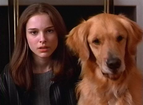 Good photos of Portman in Mars Attacks! are hard to come by, but she has a great dog. (Credit: Warner Brothers)