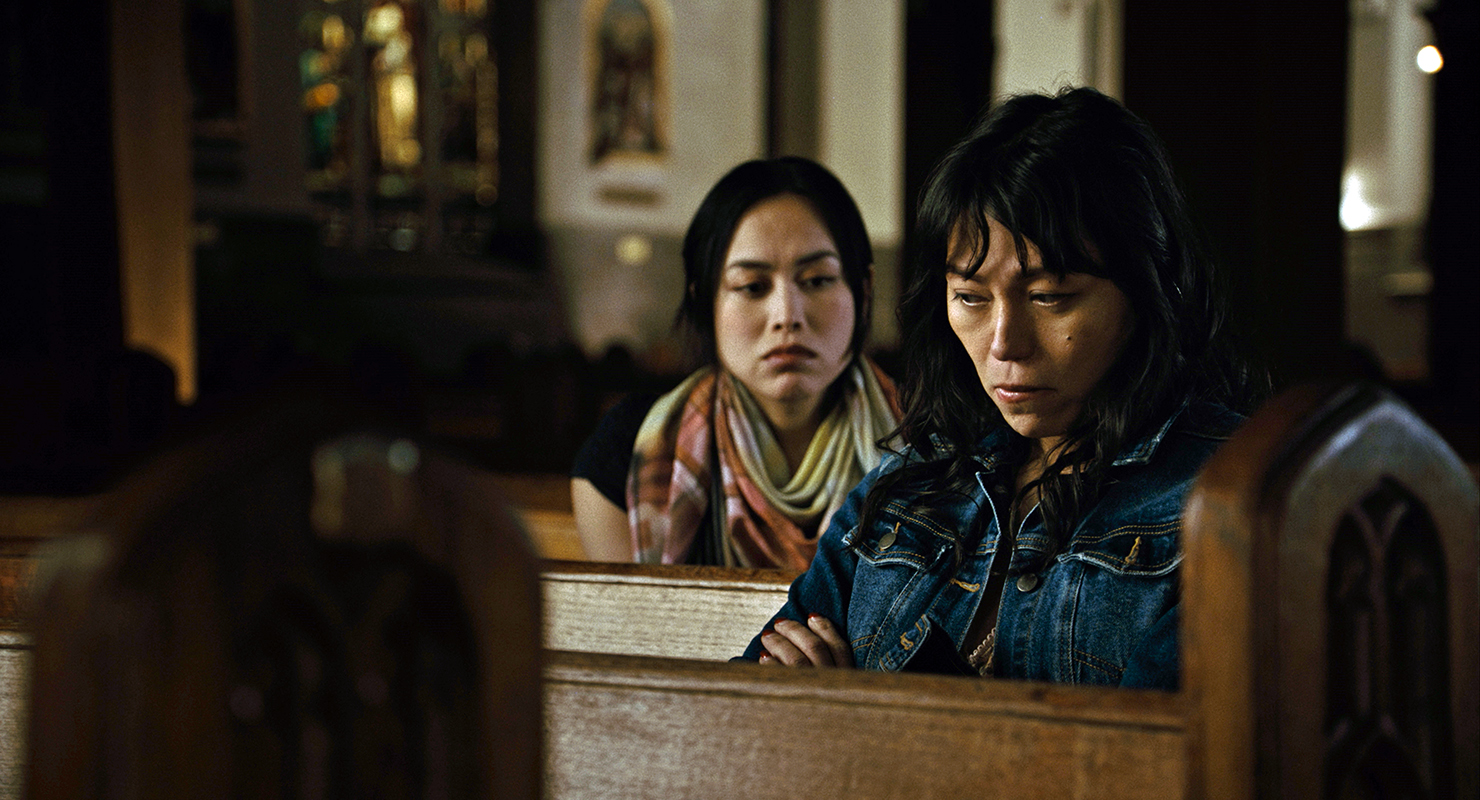 Trixie and Olivia (foreground) discuss Olivia