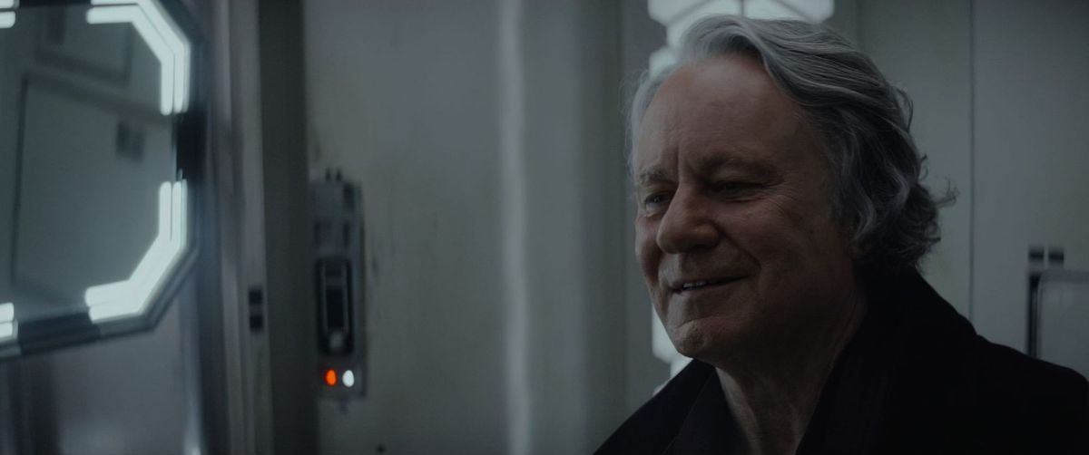 Luthen practices his pleasant antique dealer smile as he prepares to leave his Rebel life behind.