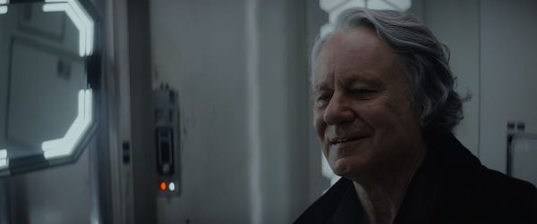 Luthen practices his pleasant antique dealer smile as he prepares to leave his Rebel life behind.