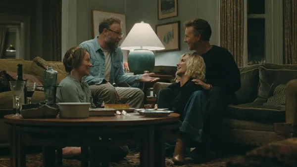 The cast of The Invite kicks back and relaxes in an upscale living ro