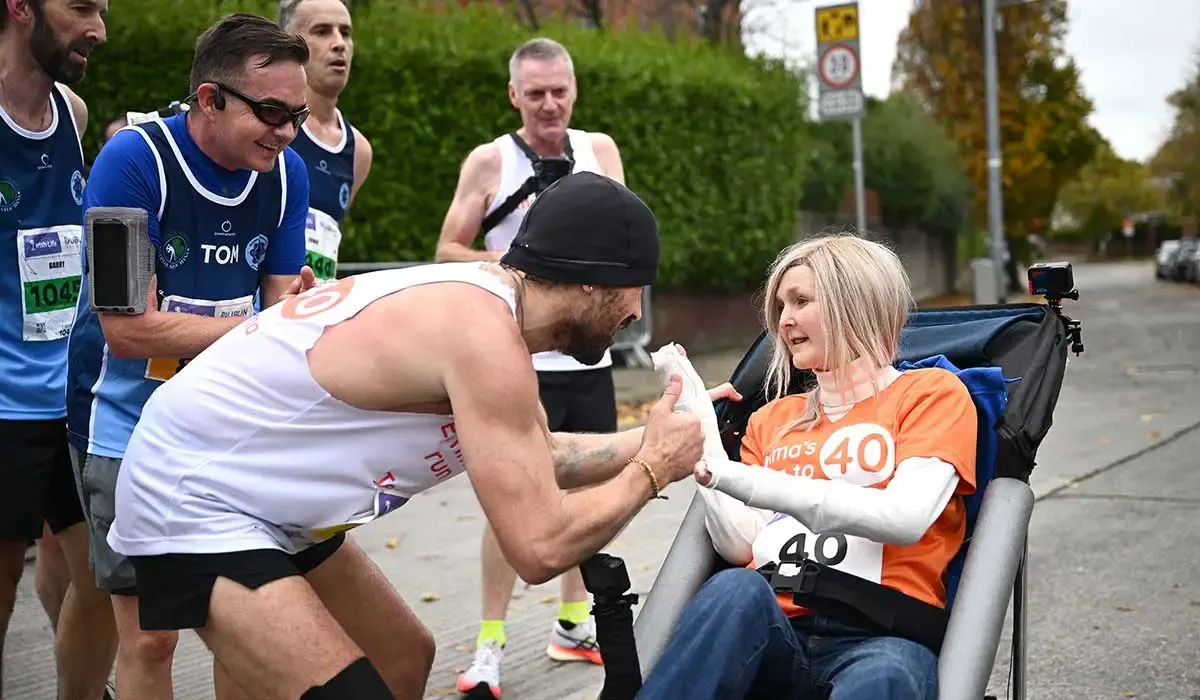 Colin Farrell Crosses Dublin Marathon Finish Line with Heart and Determination—Pushing Friend Emma for Final Kilometers