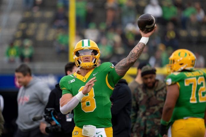 Top-Ranked Ducks Rally for Tough Road Victory Against Wisconsin Badgers