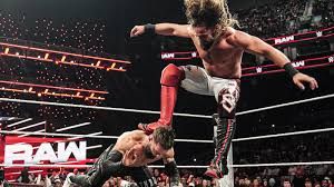 Seth Rollins and Roxanne Perez Secure Their Spots in the Elimination Chamber – Who Will Be Next