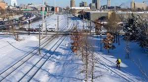 First Big Snow Hits for Holiday Travelers in the Twin Cities