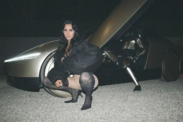 Kim Kardashian Denies Claim Elon Musk Paid Her to Pose with $30K Tesla Robot in Steamy Photoshoot