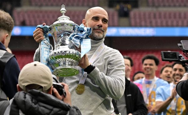 Chelsea v Manchester City, London, UK - 16 May 2025 Pep Guardiola, Manager of Manchester City, celebrates with the FA Cup during the FA Cup Final match between Chelsea and Manchester City on