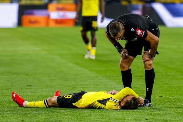 DORTMUND - Konstantinos Karetsas of Borussia Dortmund lies injured on the ground during the UEFA Champions League match between Borussia Dortmund and Villarreal CF at Signal Iduna Park on Se