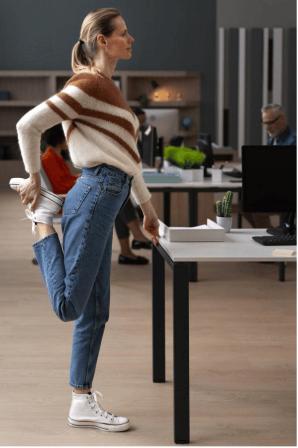 woman-office-stretching-during-work-day (1)