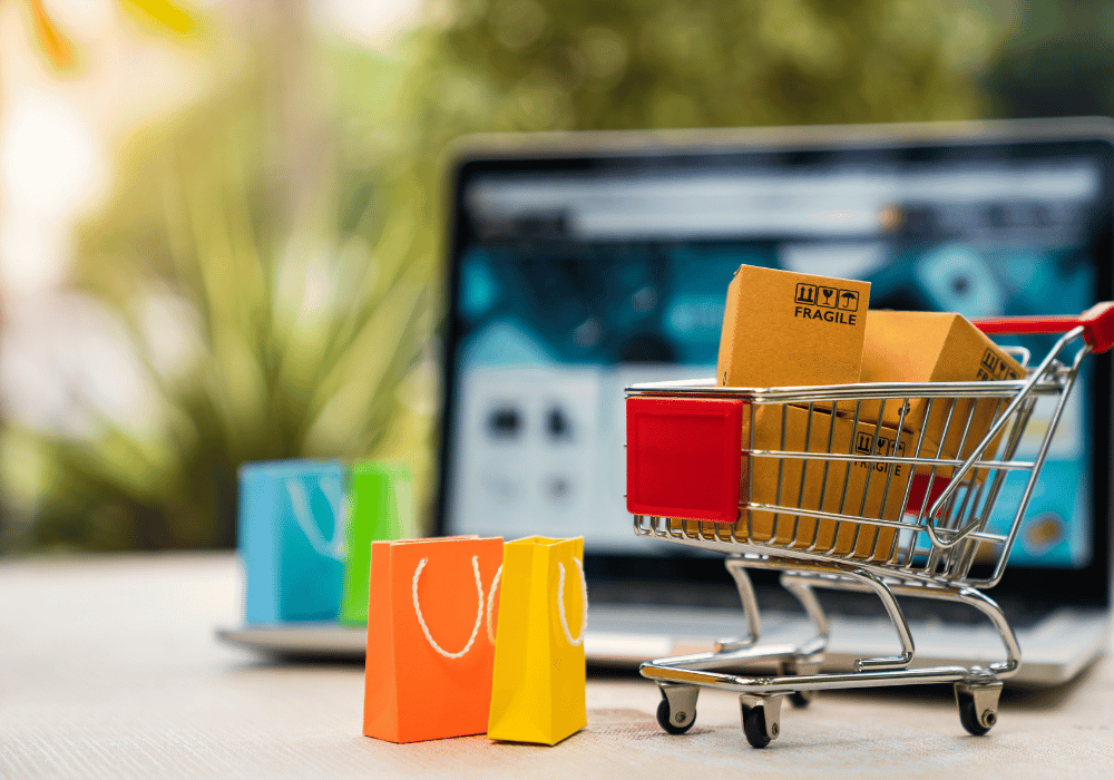 A person wearing blue light glasses and looking at a device with a blue light filter and being protected from the harmful effects of blue light