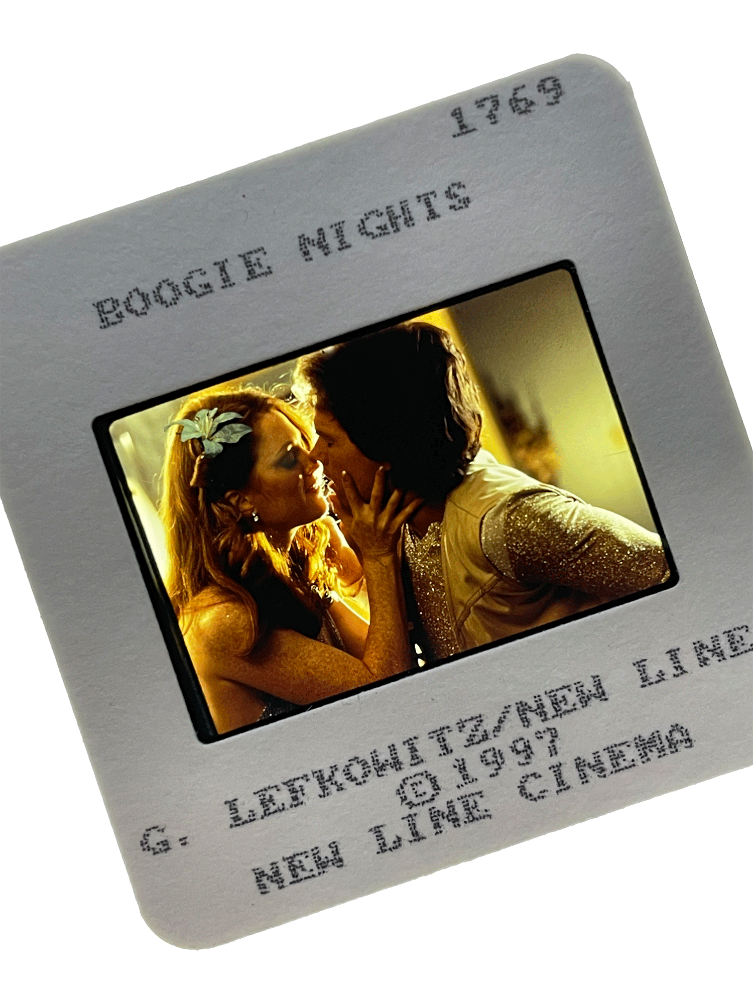 Slide from BOOGIE NIGHTS with Julianne Moore and Mark Whalberg, photo by G. Lefkowitz.