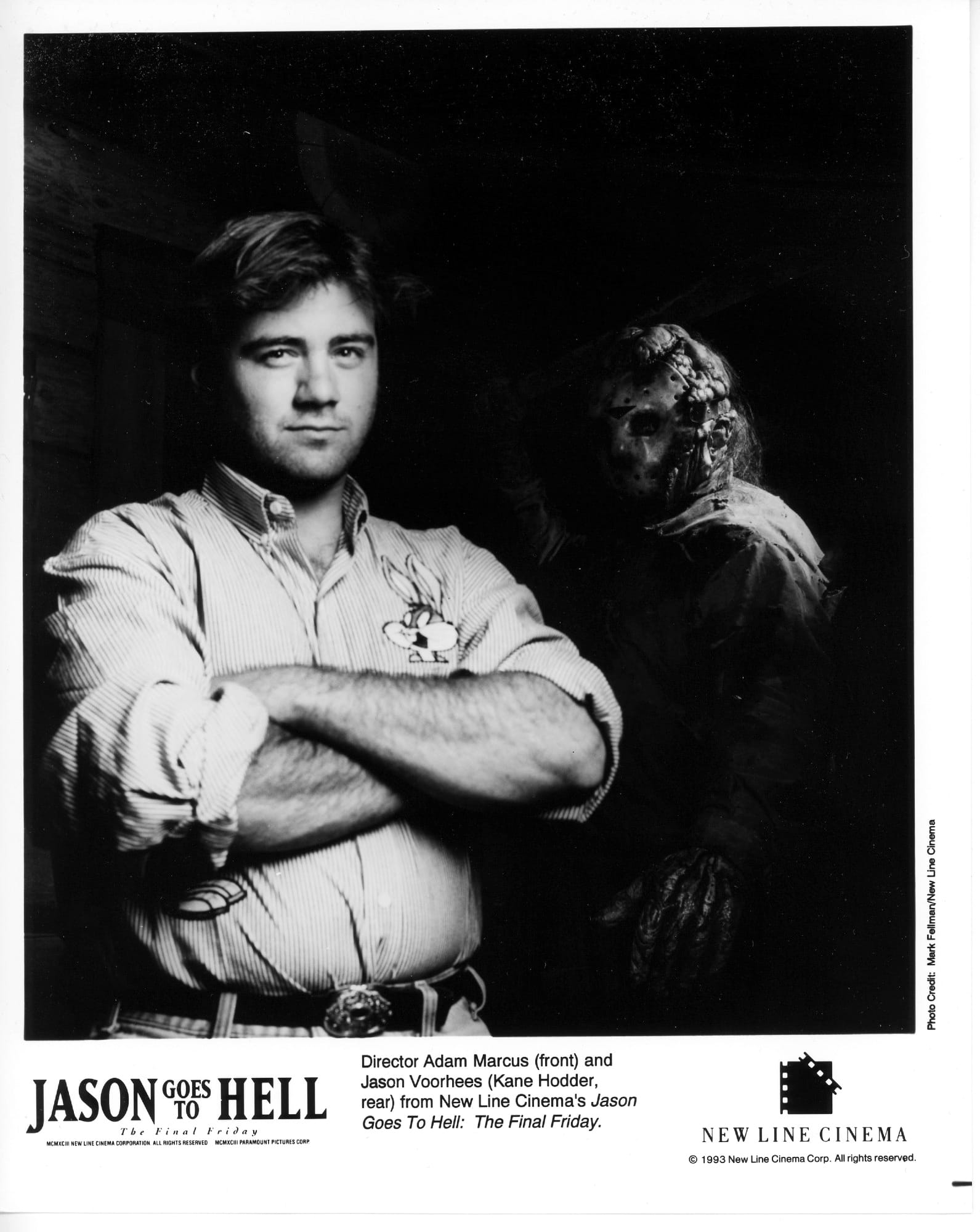 Like a JC Penney photo with the director standing in foreground (arms folded and wearing a button down with Bugs Bunny's head on the breast) and a shadowy Jason Voorhees standing menacingly in the background.