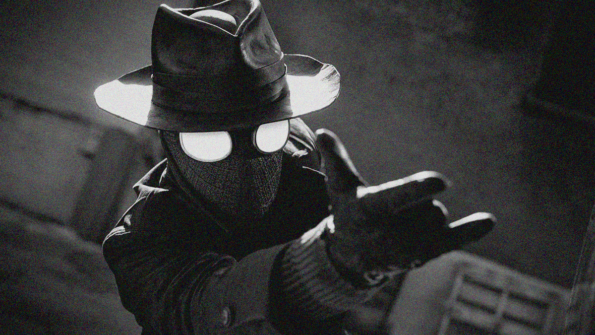 A man in trench coat, gloves, and hat wears a black mask with glowing eyes. His hand is outstretched to expel webbing from his wrist.