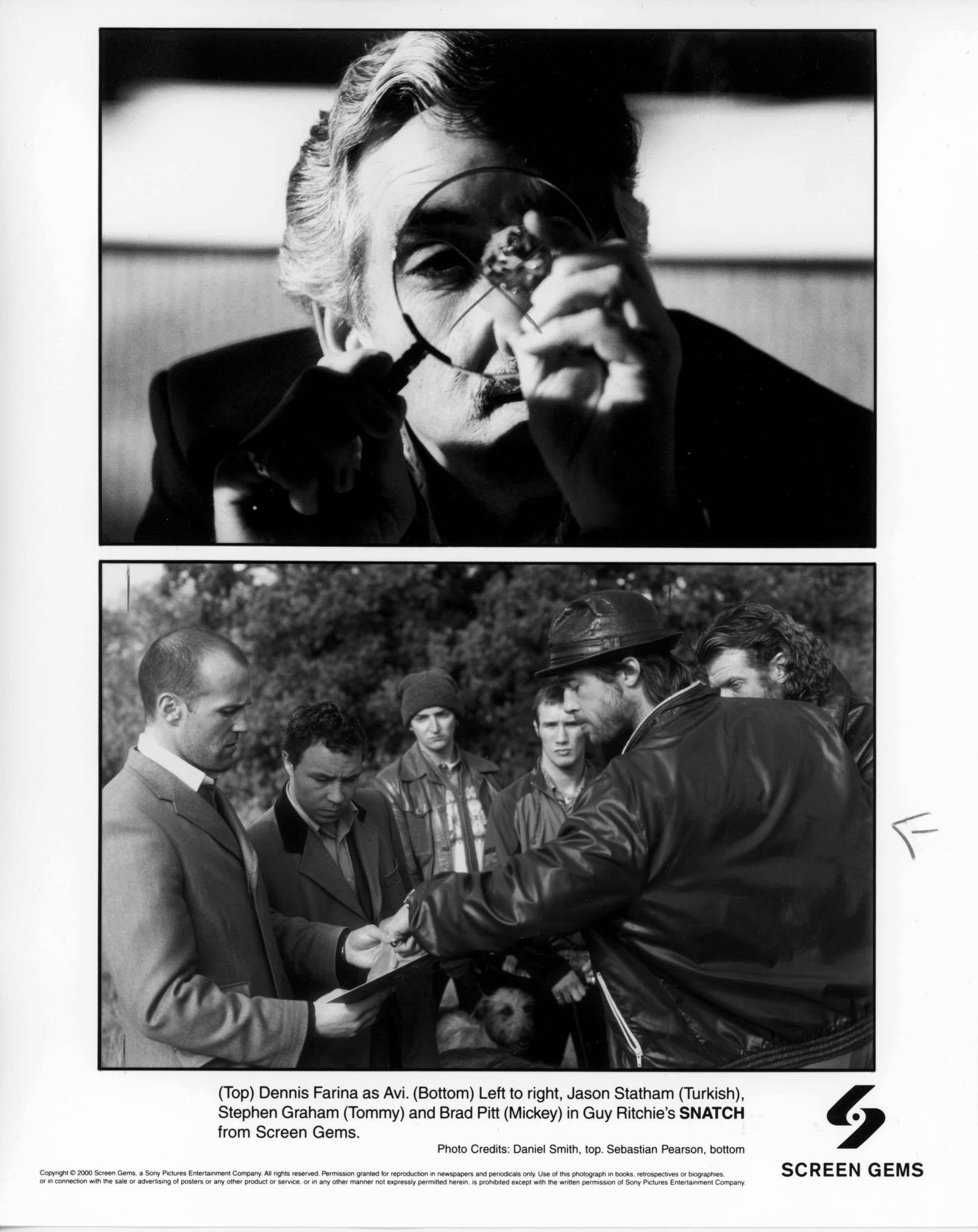 B&W Publicity photo: Top is a man in close-up looking at a large gem through a magnifying glass. Bottom is a group of men outside where one in full leather (including hat) is pointing something out on something another man is holding.