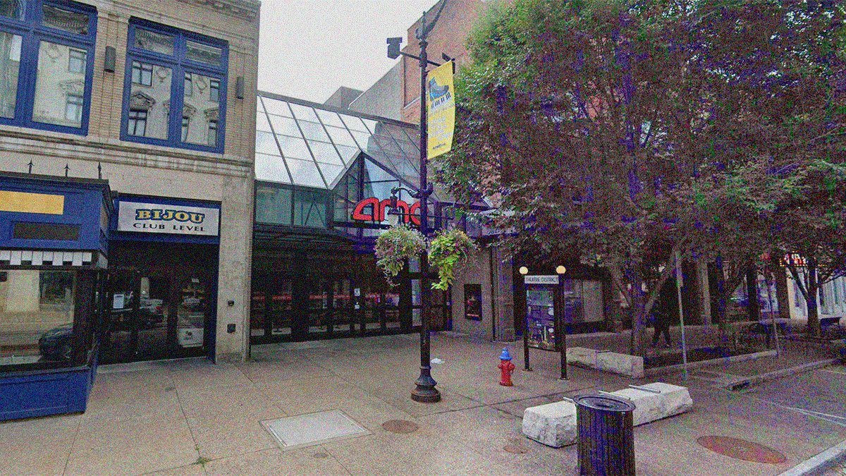 Google Maps street view of 639 Main St with its glass facade flanked by taller concrete facades.