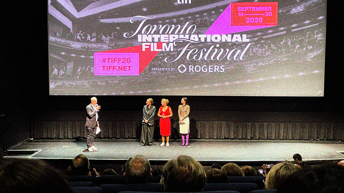 Four people on the TIFF Lightbox stage for a post-screening Q&A after WHAT LIES BETWEEN US.