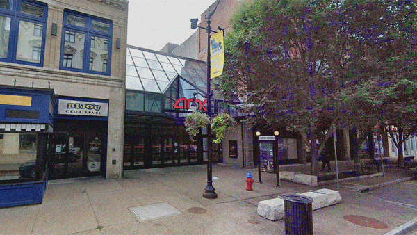 Google Maps street view of 639 Main St with its glass facade flanked by taller concrete facades.