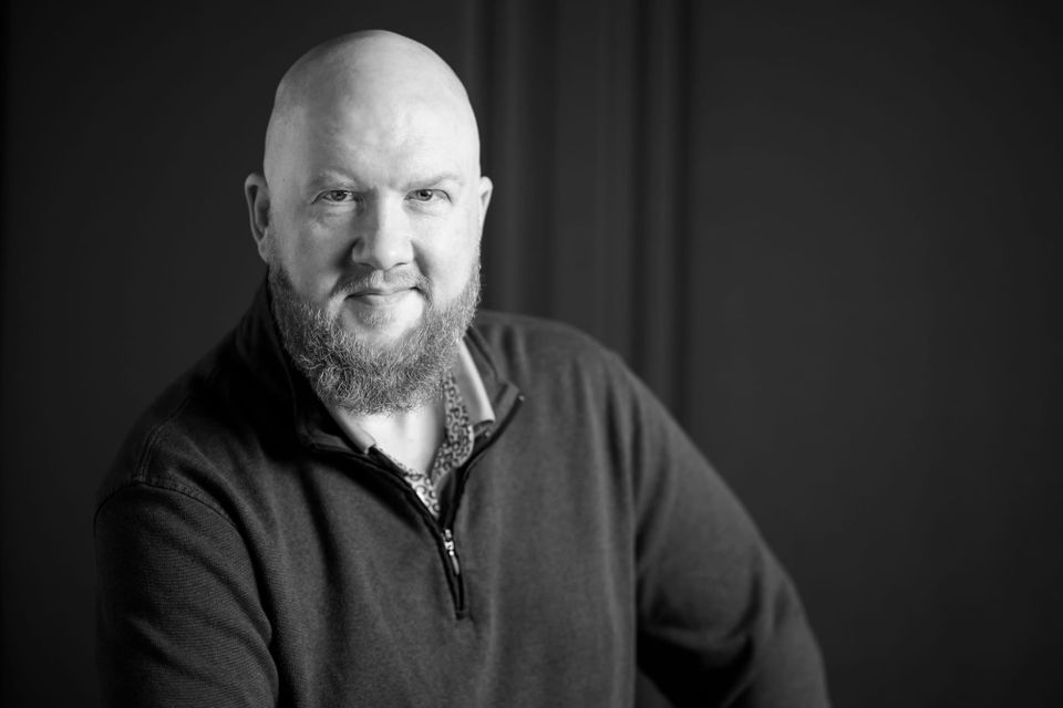 A headshot of Chris "Giddy" Giddings