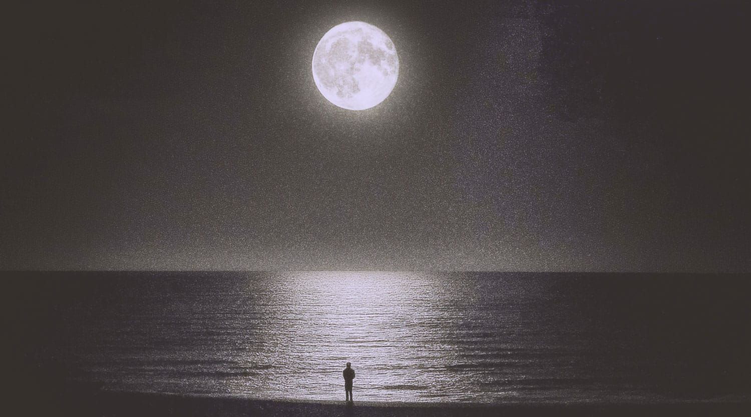 Man on the beach, staring at the bright moon with the reflection in the water. | Based on the teachings of Khawajah Shamsuddin Azeemi (RA)