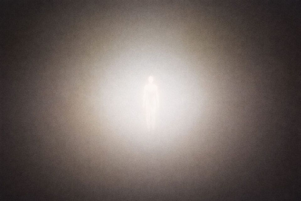 A glowing human-like silhouette stands in the center of a hazy, light-filled space, surrounded by soft gradients. | Teachings from Khawaja Shamsuddin Azeemi.