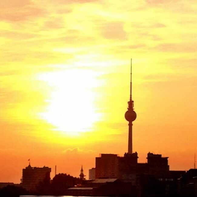 The sun setting behind the TV tower taken from O2World 