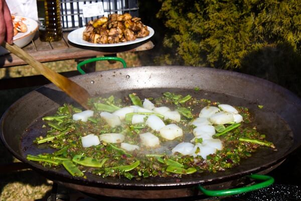 Adding Cuttlefish to the Paella in Spain Adding Cuttlefish to the Paella in Spain